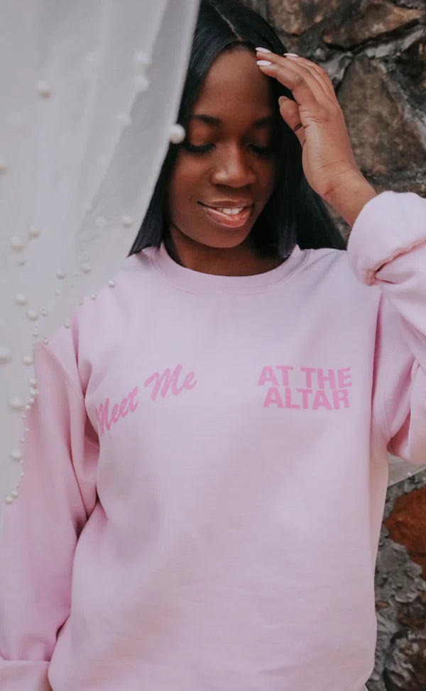White and 2025 pink sweatshirt